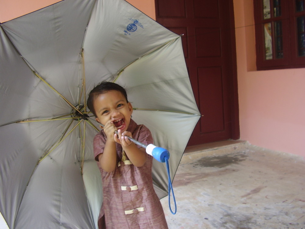 Sreekutty with Umbrella
